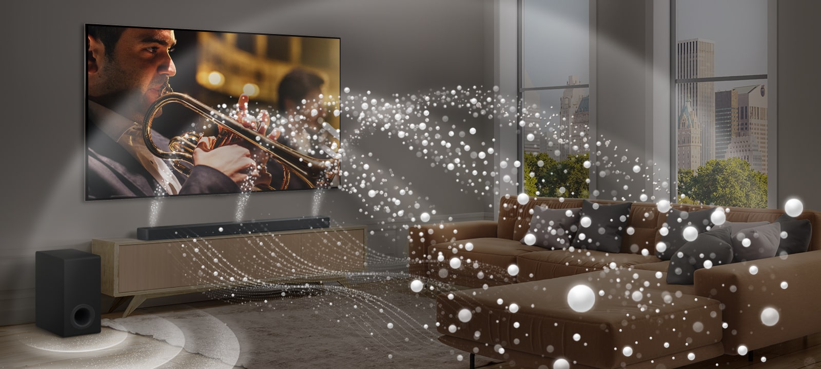 LG Soundbar, LG TV ve subwoofer modern bir apartman dairesinde. LG Soundbar’dan zeminin alt k?sm?nda süzülen beyaz damlac?klardan olu?an ü? kollu ses dalgalar? yay?l?yor. Soundbar’?n üst k?sm?ndan beyaz damla ?eklinde daha fazla ses dalgas? yay?l?yor. Soundbar’?n yan?nda alttan ses efekti olu?turan bir subwoofer yer al?yor. Birlikte odan?n i?inde bir kubbe efekti yarat?yorlar.