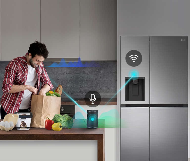 Man unpacking groceries in kitchen with smart speaker connected to LG fridge, surrounded by vegetables and eggs.