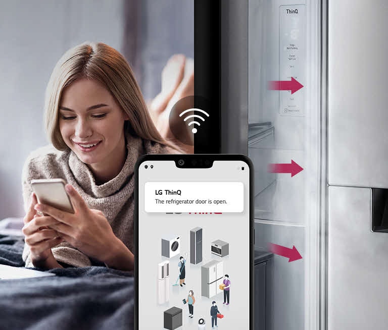 Woman checking her phone with LG ThinQ app notification about the refrigerator door being open.