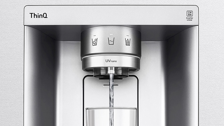 LG ThinQ water dispenser with UVnano, filling a glass with water, featuring icons for ice and water options.