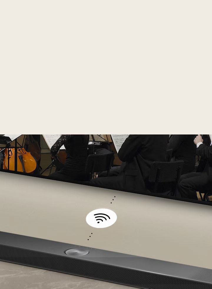 A close up of an LG Soundbar below a LG TV. A connectivity symbol is in between LG Soundbar and a LG TV, showing WOWCAST's wireless operation.