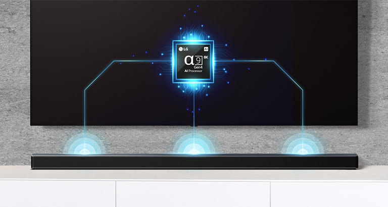 There is an alpha nine chip image on TV and there is a soundbar right below. There are also soundwave effect coming out from soundbar. 