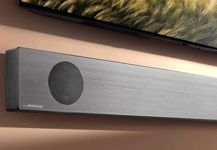 A home cinema room is complete with an LG soundbar.