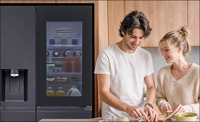 Two images of the inside of a refrigerator filled with ingredients and a couple cooking in the kitchen