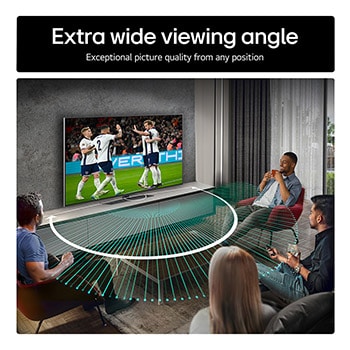 Living room space with a wall-mounted LG OLED TV. On the TV is a mountain range against a dark evening sky filled with stars. This scene is split in half. One side shows a duller, grayer version of the landscape labeled, Non Perfect Black display. On the other side is a more pleasing picture with a larger dynamic range of blacks and whites. 