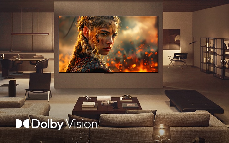 Kh?ng gian phòng khách có LG TV OLED treo t??ng. Trên TV ?ang chi?u m?t b? phim, v?i màu s?c, ?? r? nét và ?? t??ng ph?n ?áng kinh ng?c. Logo Dolby Vision c?ng hi?n th?.