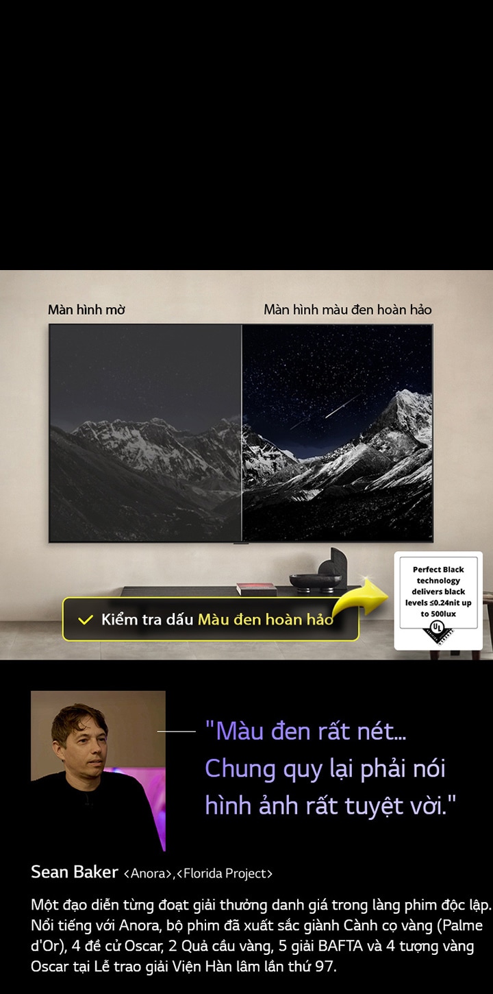 LG OLED TV treo t??ng. Màn hình TV chi?u hình ?nh d?y núi trên n?n b?u tr?i ?êm ??y sao. Màn hình ???c chia làm hai n?a. M?t ??u ???c dán nh?n màn hình Màu ?en kh?ng hoàn h?o có màu xám x?n, kh?ng nhìn th?y r? sao. ??u còn l?i ???c dán nh?n màn hình Màu ?en hoàn h?o có màu ?en t?i s?m, nhìn th?y nh?ng ng?i sao tr?ng sáng, t?o ra hình ?nh m?n nh?n v?i ?? t??ng ph?n cao.