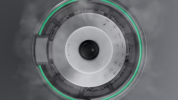 A view from above the Air Purifier with puffs of water vapor surrounding the machine.