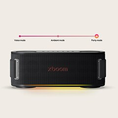 LG xboom is casting a yellow light, with the features of AI Lighting, Voice Mode, Ambient Mode, and AI Party Mode shown above it.