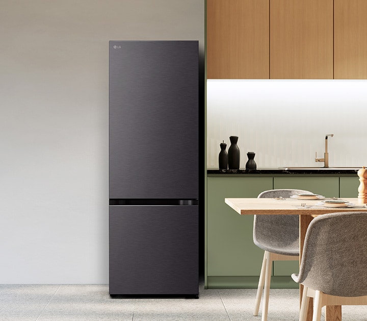 lg bottom freezer refrigerator with water dispenser in a modern kitchen.