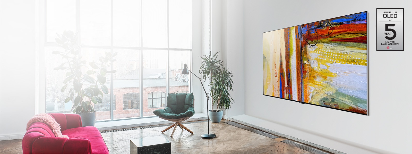 Pilt telerist LG OLED G3, mis n?itab heledas ja erksas ruumis v?rvilist abstraktset kunstiteost.