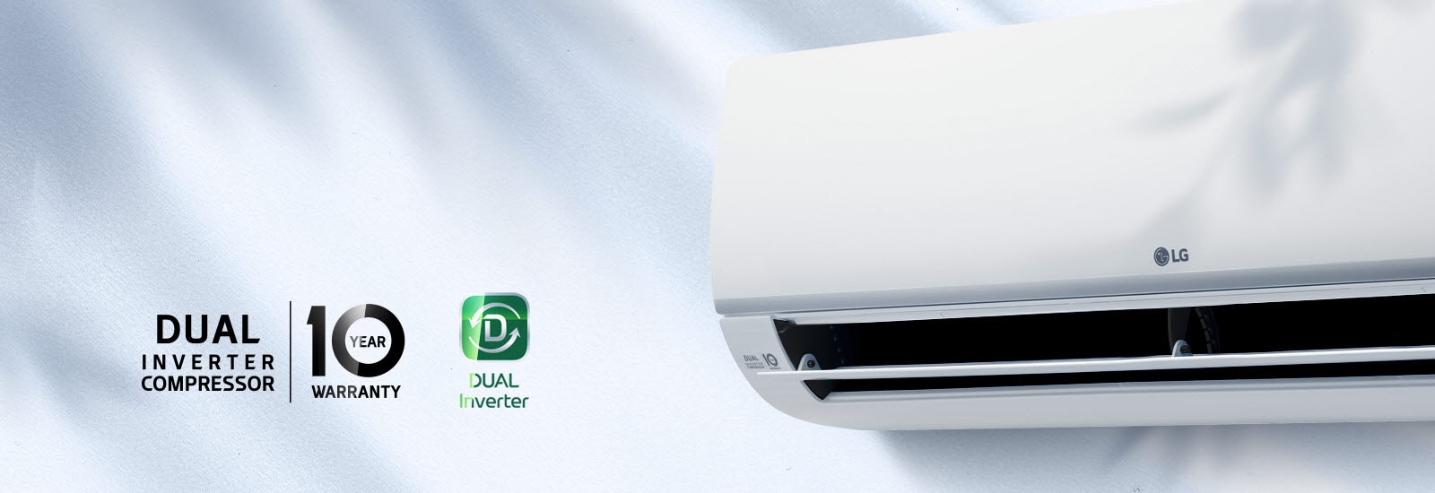 Kliimaseadme esikülg, millel keskel on LG logo ja vasakul 10-aastase garantii logo. Suurem kahekordse inverteriga kompressor | Pildist vasakul on 10-aastase garantii logo ja Dual Converteri logo mis s?ravad, kui nende peal kumab valgus.