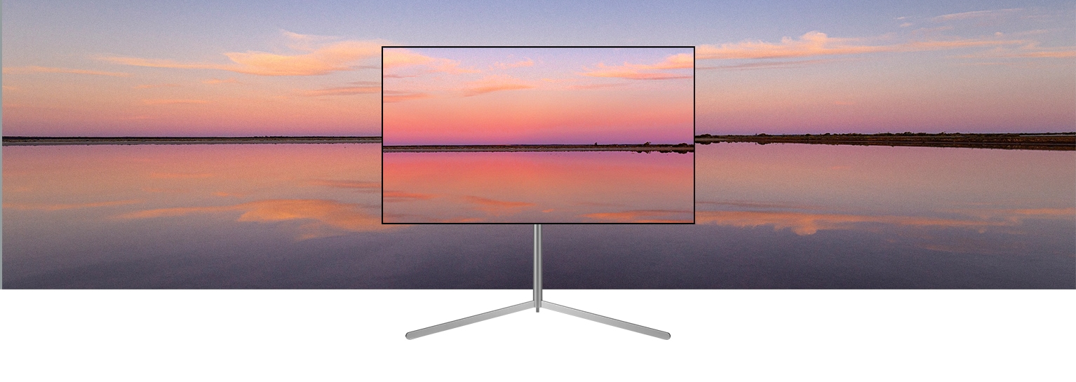 Gallery Stand -jalustalla olevassa LG OLED -televisiossa n?kyy sininen ja vaaleanpunainen auringonlasku, joka sulautuu taustaan