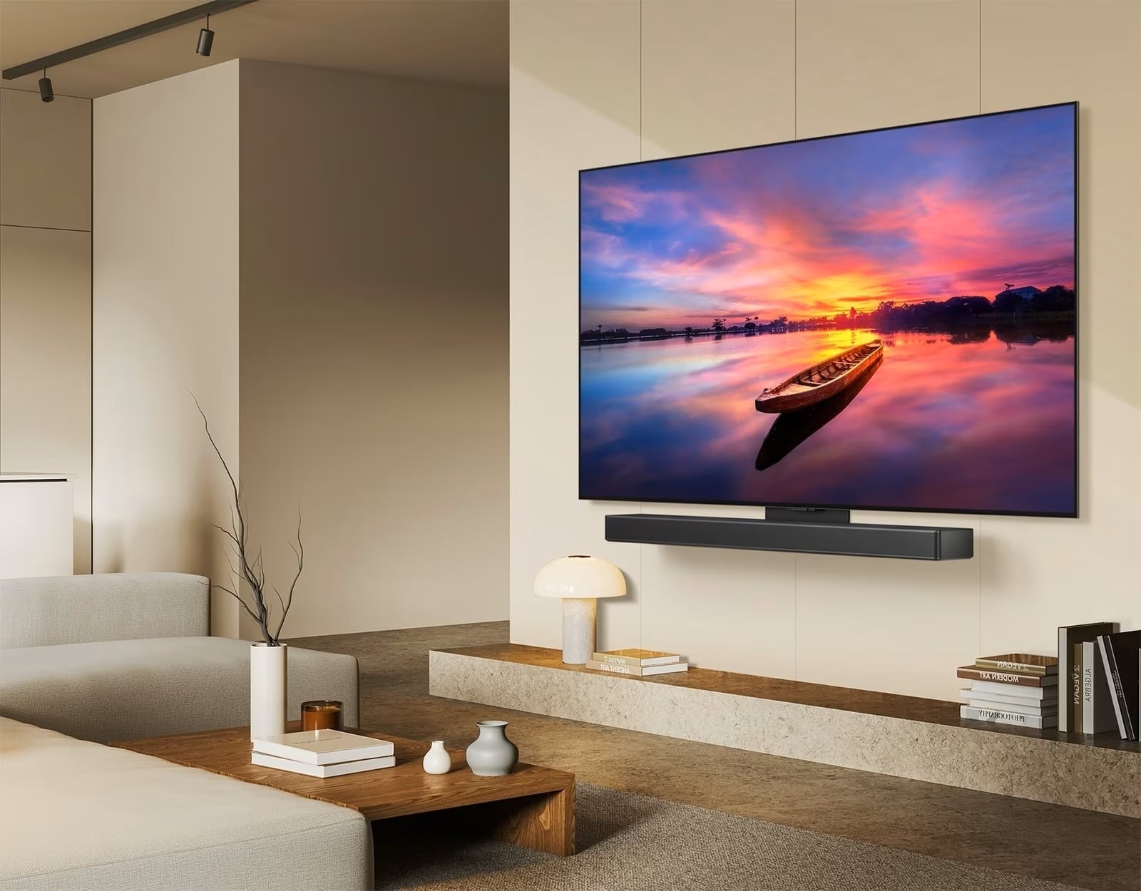 un téléviseur OLED de LG avec une barre de son affichant un magnifique coucher de soleil. Le produit offre une qualité d’image et de son exceptionnelle, idéale pour les jeux et les expériences cinématographiques.
