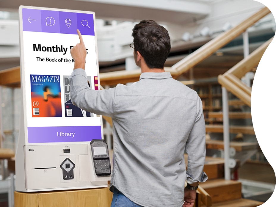 A visitor is looking for some information using the LG Kiosk. The LG Kiosk has a seamless design in two tones of calming beige. It features a 27-inch in-cell display with Full HD and runs on Windows OS.