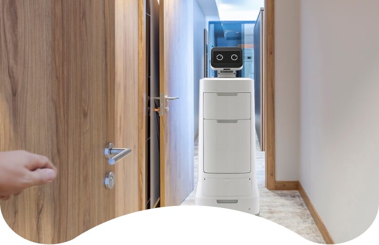 As the hotel guest room door opens, there lies a LG CLOi ServeBot bringing guest order. Be it food or any other ammenity, LG CLOi can serve.