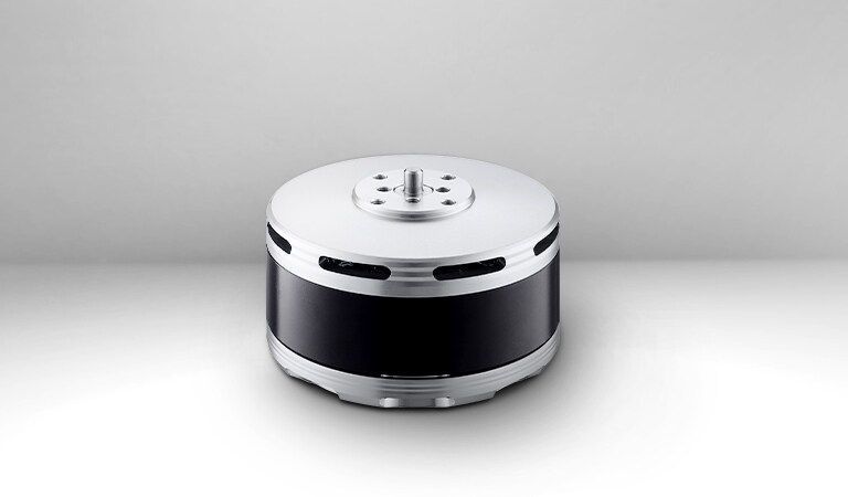 There is a Drone BLDC Motor in the background of gray gradation
