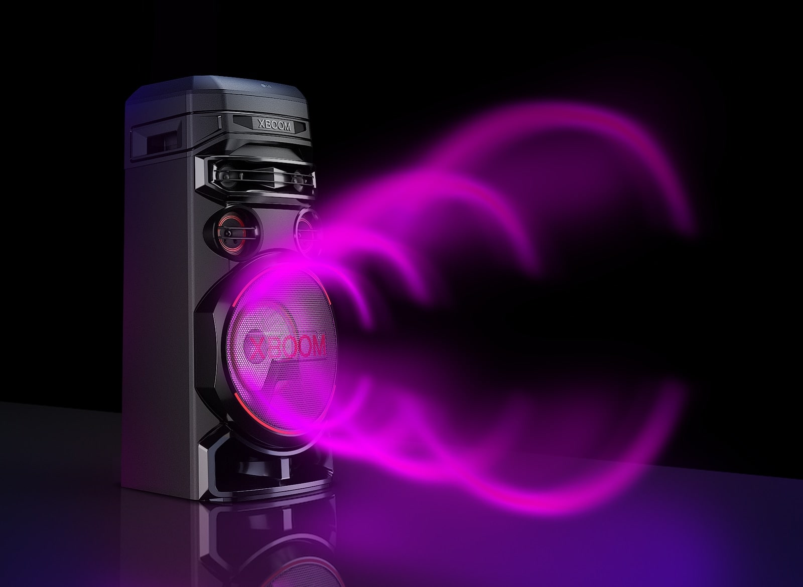 LG XBOOM rnc7 with a left side forward against a black background. The purple circular sound graphic comes out from the woofers.