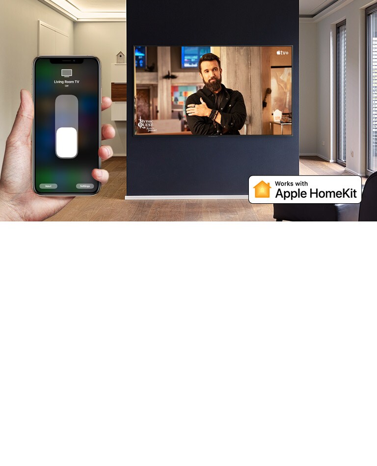 Closeup of hand controlling TV with iPhone and TV showing an Apple TV+ content