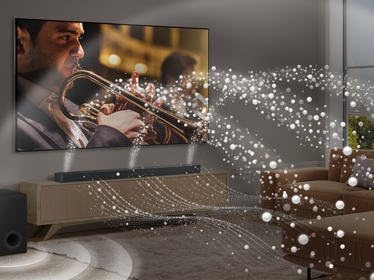 En LG Soundbar, LG TV og subwoofer er i en moderne byleilighet. LG Soundbar avgir tre grener av lydb?lger, laget av hvite dr?per som flyter langs bunnen av gulvet. Flere hvite dr?pelydb?lger avfyres opp fra toppen av lydplanken. Ved siden av Soundbar er en subwoofer, som skaper en lydeffekt fra bunnen. Som helhet skaper de en kuppeleffekt over hele rommet.