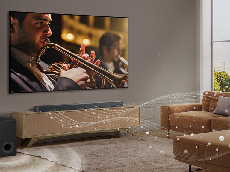 En LG Soundbar, LG TV og subwoofer er i en moderne byleilighet. LG Soundbar avgir tre grener av lydb?lger, laget av hvite dr?per som flyter langs bunnen av gulvet. Ved siden av Soundbar er en subwoofer, som skaper en lydeffekt fra bunnen.