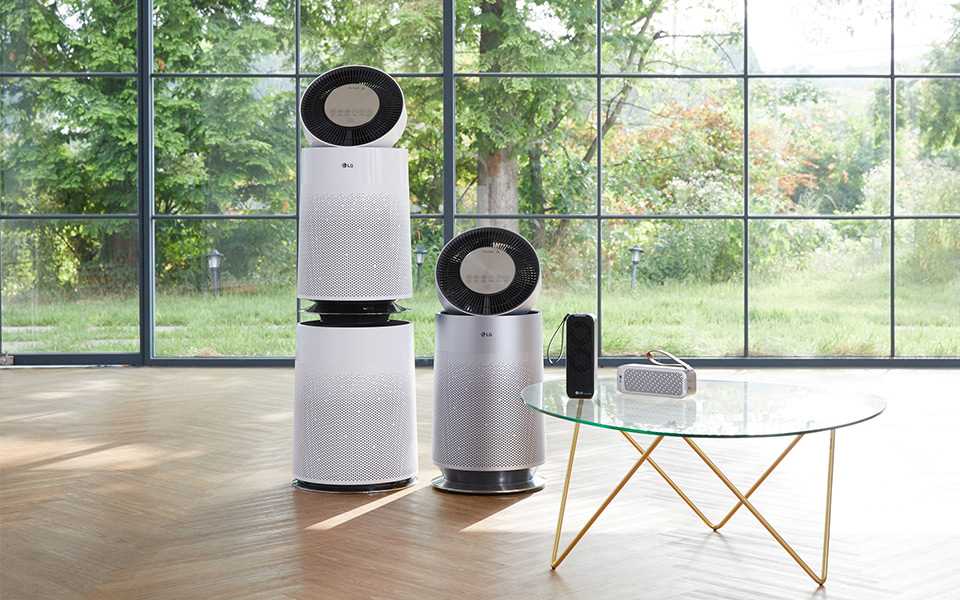 The LG PuriCare? Air Purifier range on display in a home living space
