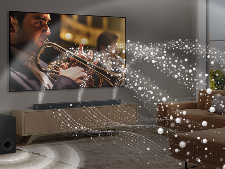 O bar? de sunet LG, un televizor LG ?i un subwoofer sunt ?ntr-un apartament modern dintr-un ora?. Bara de sunet LG emite trei ramuri de unde sonore, formate din pic?turi albe care plutesc de-a lungul podelei. Mai multe unde sonore sub form? de pic?turi albe sunt lansate din partea superioar? a barei de sunet. Lang? bar? se afl? un subwoofer, care genereaz? un efect sonor din partea de jos. ?mpreun?, acestea creeaz? un efect de dom ?n ?ntreaga camer?.