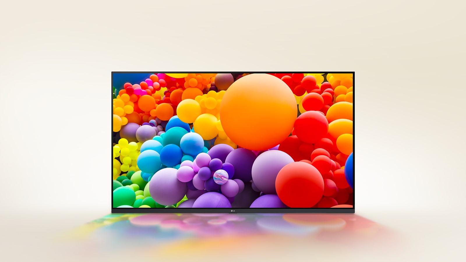 Imagine cu baloane ?n culori diferite afi?ate pe televizorul LG UHD.