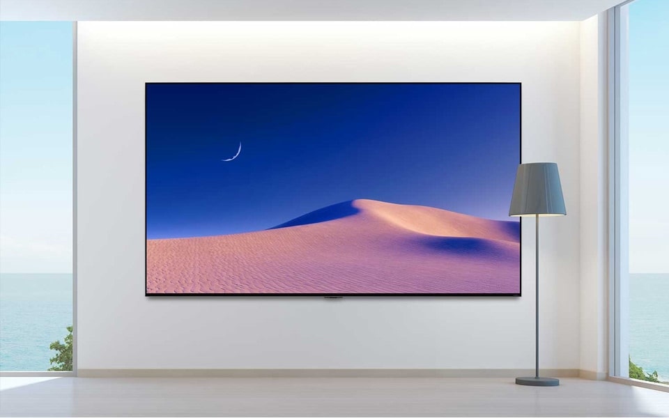 Dune de nisip din de?ert pe un televizor LG de mari dimensiuni.