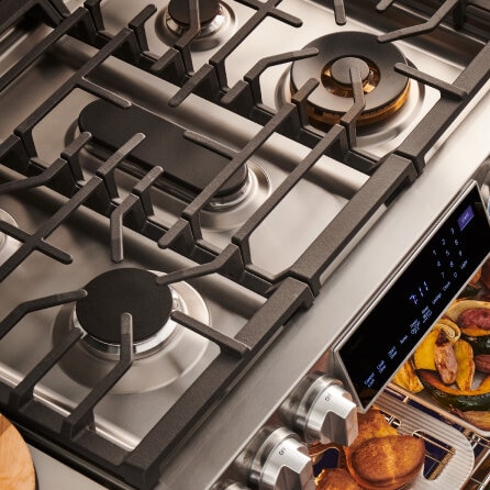 LG Studio gas range with multiple burners and oven compartments, perfect for precise cooking and baking.